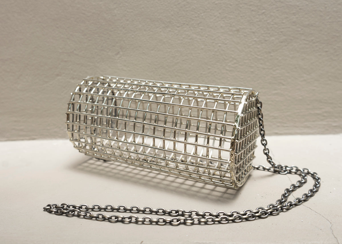 Metal cage hotsell purse